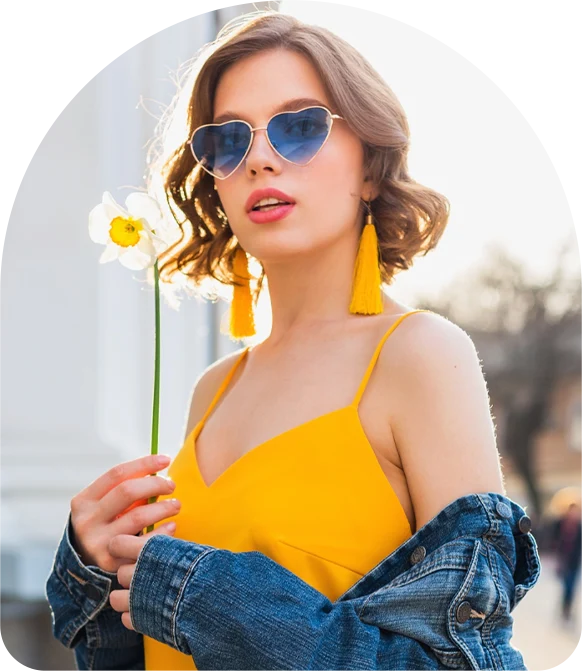 yellow dress woman holding a flower